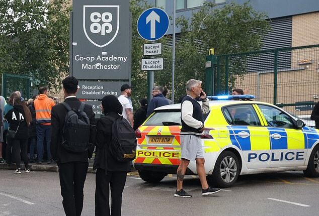 Large crowds of pupils and parents gathered at the scene after three people were injured in a stabbing