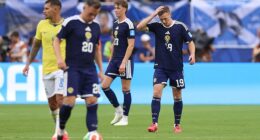 Scotland players react as the concession of another goal leaves them with a mountain to climb