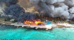 A drone view shows a huge fire breaking out at the Viva Dominicus Beach by Wyndham in Bayahibe, La Altagracia, Dominican Republic. The blaze killed one Italian woman