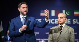 US Vice President JD Vance (L) speaks next to Pakistan's Prime Minister Shehbaz Sharif prior to a quadrilateral meeting between the United States, Iran, Pakistan and Qatar at the Burgenstock luxury hotel complex overlooking Lake Lucerne, Switzerland, on June 21