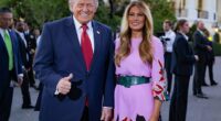 Donald and Melania Trump pose for a photo in front of the White House press photographers during the congressional picnic on the South Lawn of the White House on May 19