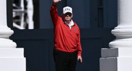Donald Trump waves as he returns to the White House in Washington, DC, on May 31, 2026, after golfing at his Trump National Golf Club in Sterling, Virginia