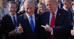 Donald Trump poses for a photo with Israel's Prime Minister Benjamin Netanyahu before he boards Air Force One at Ben Gurion International Airport, October 13