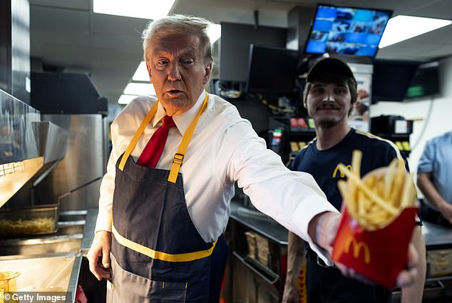 'Someone has got to really quietly sit down and talk with him, and say, "You're playing with fire," advised Dr Fischer, who noted Trump's well-known penchant for McDonald's. (Pictured: President Trump at McDonald's during a campaign stop in October, 2024)