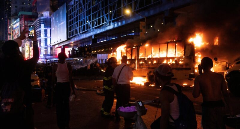 World Cup bus set on fire as chaotic celebrations erupt in New York after Knicks win