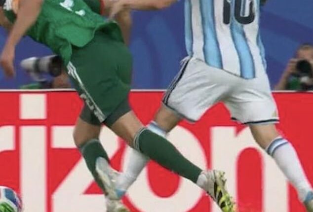 World Cup fans think the tournament is rigged after Lionel Messi avoided a red card for a stamp