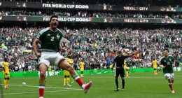 Raul Jimenez celebrates after scoring the first goal of the World Cup in the opening game