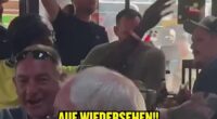 England fans mocked Germany's exit as they geared up for their clash with DR Congo in Atlanta - in this picture they were signing 'Auf Wiedersehen!' after they lost to Paraguay on penalties