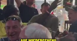 England fans mocked Germany's exit as they geared up for their clash with DR Congo in Atlanta - in this picture they were signing 'Auf Wiedersehen!' after they lost to Paraguay on penalties