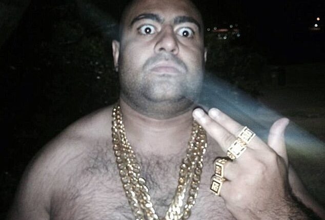 Notorious gangster Mohammad Qais Niazy will remain behind bars after being caught defecating and urinating near the elevators in the lobby of Sydney's tallest office building