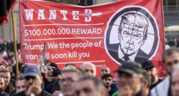 Video from Tehran shows pro-regime demonstrators with posters featuring red crosshairs over the faces of Trump