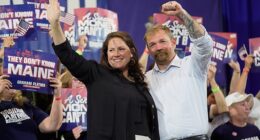 Democratic U.S. Senate candidate Graham Platner, right, and his wife Amy Gertner gesture to supporters during a primary election night watch party Tuesday, June 9, 2026, in Blue Hill, Maine