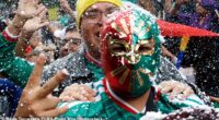 Mexico City will play host to England fans for the last-16 clash with one of the host nations - pictured is a man in a traditional Mexican wrestling mask after their win over Ecuador