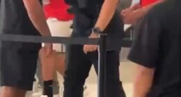 Dramatic footage shows assistant coach Ibrahim Hassan, the twin brother of Egypt boss Hossam Hassan, arguing with officers before appearing to lunge towards them