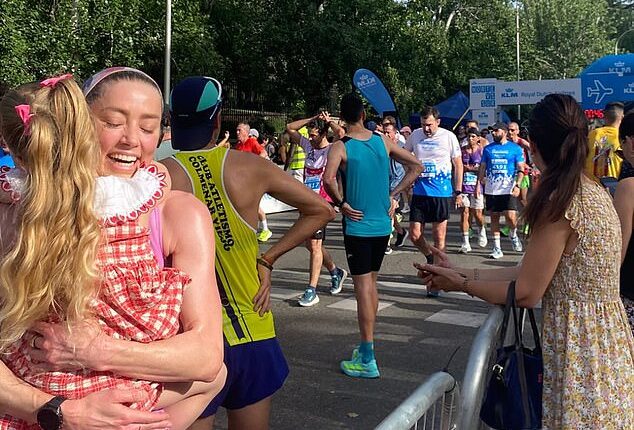 Inside Amber Heard low-key life in Madrid as she ditches dating to focus on raising her children (pictured with eldest daughter Oonagh at the KLM Norte Sur 10K race in Madrid on June 21)