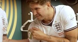 John Stones winced as he pointed to his shoulder