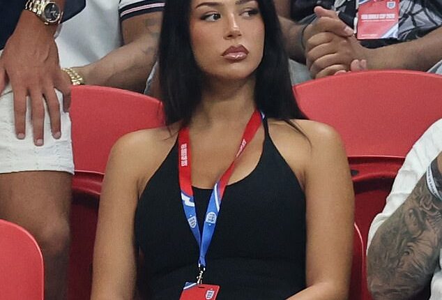 Jude Bellingham's girlfriend Ashlyn Castro dressed to impress in a black halterneck top as she took her seat in the Atlanta Stadium ahead of England's World Cup clash against DR Congo