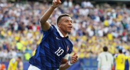 Kylian Mbappe moved within a goal of Lionel Messi's World Cup record in France's 3-0 win over Sweden