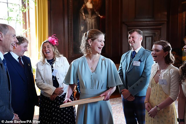 Lady Louise Windsor has been presented the Duke of Edinburgh's Gold Award by her father Prince Edward