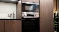 From boucle dining chairs to hanging lamps, it's easy to get caught up in the latest trendy kitchen renovations. Stock image used