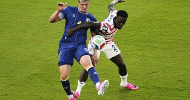 Folarin Balogun (20) fouls Bosnia's Tarik Muharemovic (4), resulting in a red card