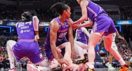 Thomas' balled hand is seen coming down on Clark's throat during Wednesday's game